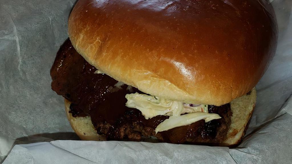 Bluff City Burger · Hand crafted Six ounces pattie. Topped with Provolone, homemade slaw, candied bacon, and bbq.