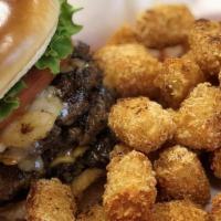 Extreme Burger · Hand crafted 18 ounces pattie. Same topping as the super. The third pattie has Swiss cheese.