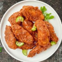 Hot Wings · Classic bone-in wings oven-baked, cooked to order perfectly crisp, tossed in our house made ...