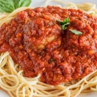 Spaghetti Modo Mio · With a choice of meatballs, sweet Italian sausage or meat sauce.