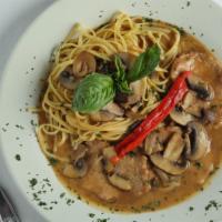Pollo/Veal Marsala · Breast of chicken or medallions of veal with wild mushrooms sauteed in a marsala wine sauce ...