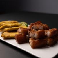 Chicharrón   6Pcs · 6 pcs of Fried Pork belly with your choice of tostones, rice, French fries,  fried batata, s...