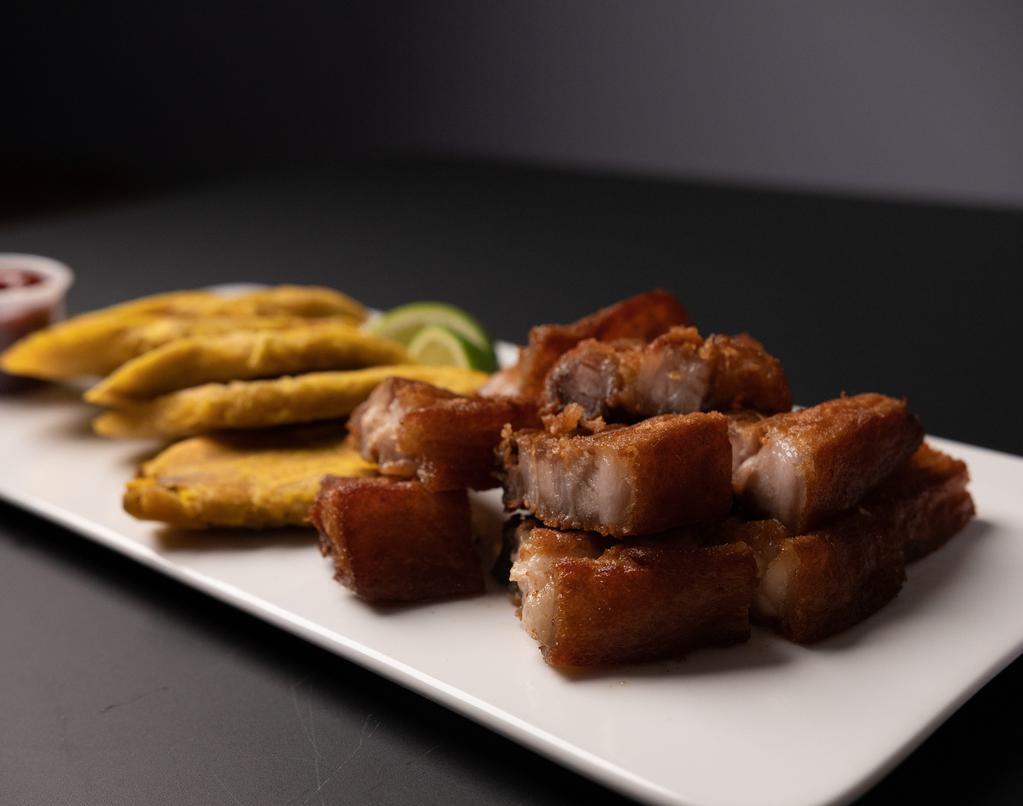 Chicharrón   6Pcs · 6 pcs of Fried Pork belly with your choice of tostones, rice, French fries,  fried batata, salad and or mix veggies.