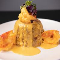 Mofongo · Fried and mashed green plantain with garlic and pork belly inside. 

Add  choice of meat and...