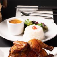 Pollo Al Horno / Baked Chicken.  1/2 · Half a chicken with your side of choice