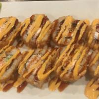 S43 The Bomb Roll · Snow crab, cream cheese and avocado inside (fried), served with eel sauce and spicy mayo.