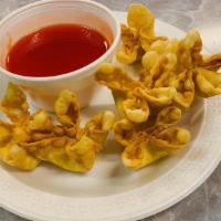 Fried Crab Meat Rangoon (8) · Cream cheese filling
Served with sweet sour sauce on the side.