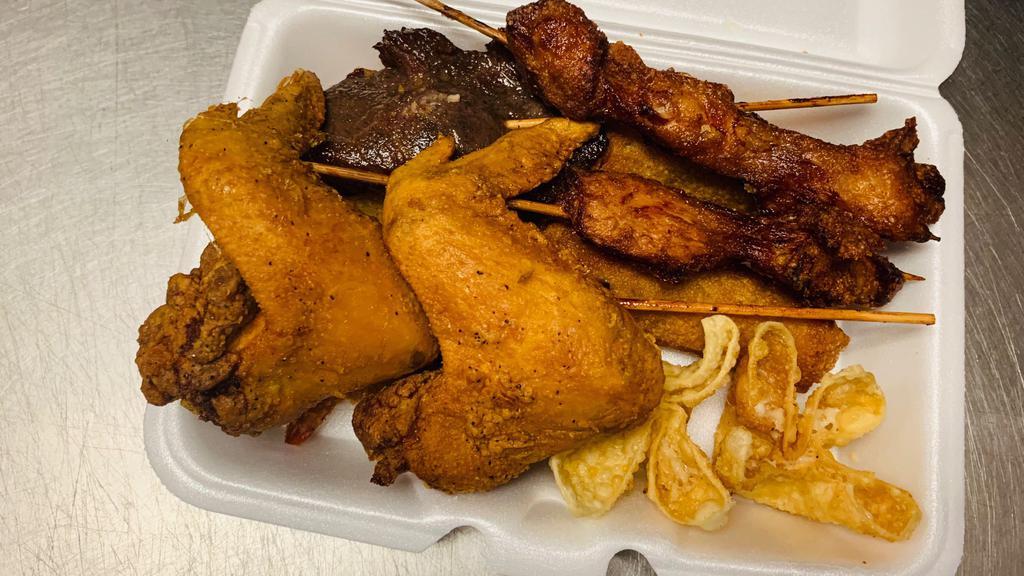 Pu Pu Platter (For 2) · Egg roll(2), Chicken wings(2), Chicken skewer(2), Beef skewer(2), Fried jumbo shrimp(2), Fried crabmeat rangoon(2). Served with sweet sour sauce on the side.