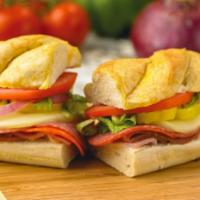 Hometown Sub · Fresh slices of ham, salami and pepperoni piled high with melted Provolone, crisp lettuce, t...