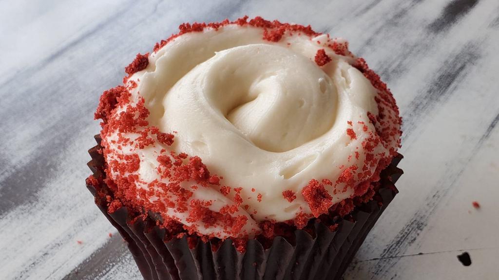 Cupcake, Red Velvet · Light chocolate red velvet cake with cream cheese icing.