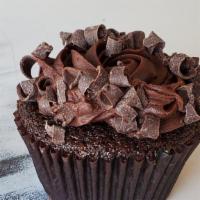 Cupcake, Chocolate Fudge · Chocolate fudge cake topped with chocolate buttercream and chocolate curls.
