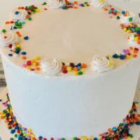 Funfetti Signature Cake · 4 layers of Funfetti Cake, layered with Cream Cheese Frosting & finished with Buttercream an...