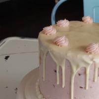 Strawberry Signature Cake · 4 layers of Strawberry Butter cake layered with Strawberry Cream Cheese frosting