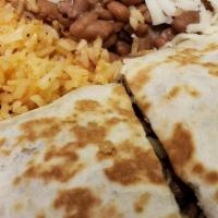 Quesadilla Plate · Flour tortilla filled with cheese and your choice of meat. Serve with rice an beans.