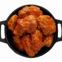 Boneless Wings · Classic boneless wings oven-baked, cooked to order perfectly crisp, tossed with your choice ...