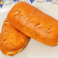 Jalapeno Bread · Bolillo stuffed with jalapenos and cheese.