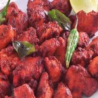 Chicken 65 · Spicy. Marinated chicken fried and sautéed with green chilies and Garam Masala.