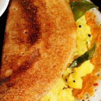 Mysore Masala Dosa (V) · Spicy dosa with potato masala, lentil soup and chutneys.