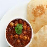 Poori Chole (2Pc) · Poori with chickpea curry.