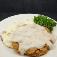 Country Fried Steak (Lunch) · Breaded sirloin, deep fried and covered with white skillet gravy. Served with our mashed red...