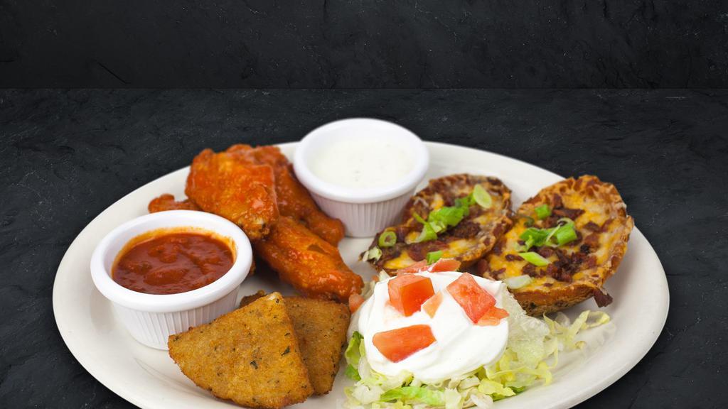 Appetizer Combo · A great sampling of our delicious Loaded Potato Skins, Buffalo Bites, and Mozzarella Wedges. Served with sour cream, ranch sauce and marinara sauce. (No substitutions)
