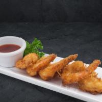 Coconut Shrimp · A great start to your meal! Enjoy five large succulent shrimp delivered with a sweet red chi...