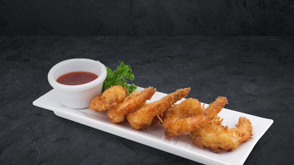 Coconut Shrimp · A great start to your meal! Enjoy five large succulent shrimp delivered with a sweet red chili sauce that will make your taste buds yearn for more.