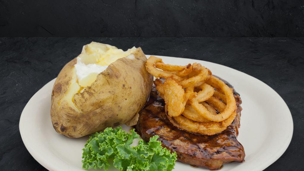 Haystack Sirloin 7 Oz. · One of Cattleman’s favorites. A lean and tasty 7 oz. sirloin topped with our own homemade bourbon glaze and topped off with our crispy Onion Haystack.