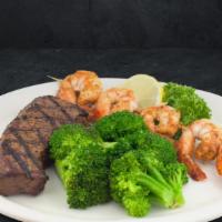Steak + Grilled Shrimp · Our 30 day aged premium 6 oz. Black Angus sirloin is cooked the way you like it and accompan...
