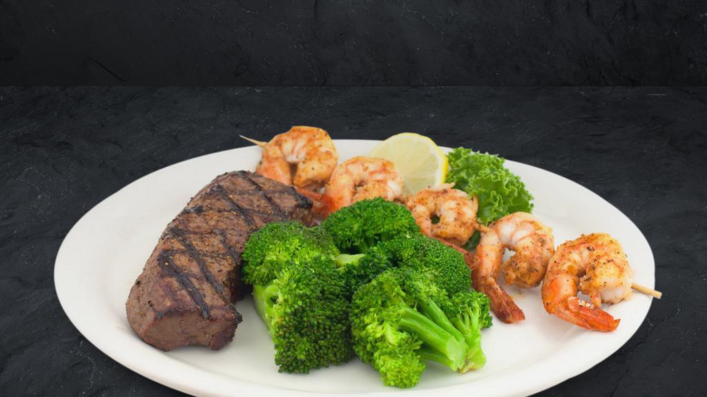 Steak + Grilled Shrimp · Our 30 day aged premium 6 oz. Black Angus sirloin is cooked the way you like it and accompanied by five jumbo blackened grilled shrimp, dusted with our special seasoning.