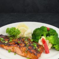 Grilled Salmon · Fresh Atlantic salmon, seasoned and grilled, then glazed with our sweet bourbon glaze and to...