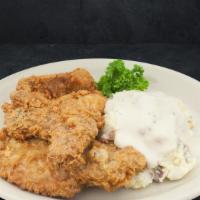Grandma'S Fried Pork Chop/S · So good you will think Grandma has an apron on in our kitchen. Grandma recommends our housem...