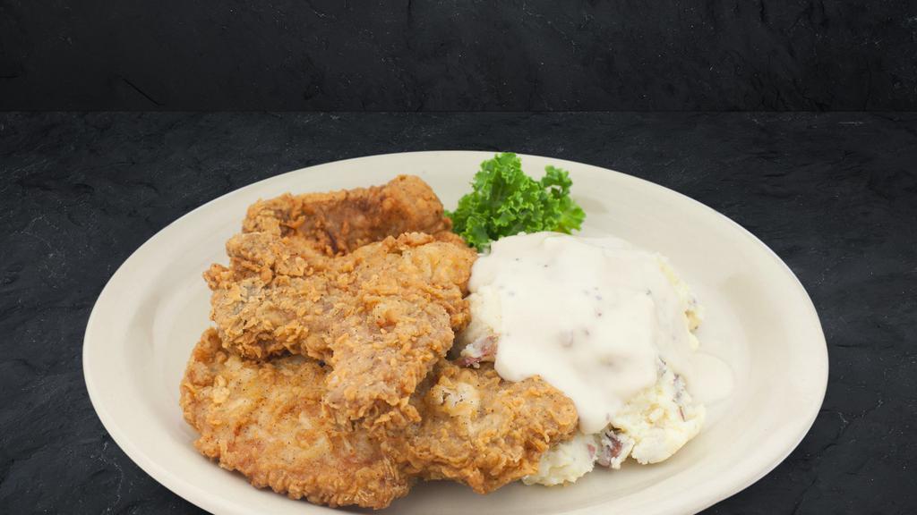 Grandma'S Fried Pork Chop/S · So good you will think Grandma has an apron on in our kitchen. Grandma recommends our housemade red skin mashed potatoes topped with white skillet gravy to complement these hand breaded bone-in chop's.