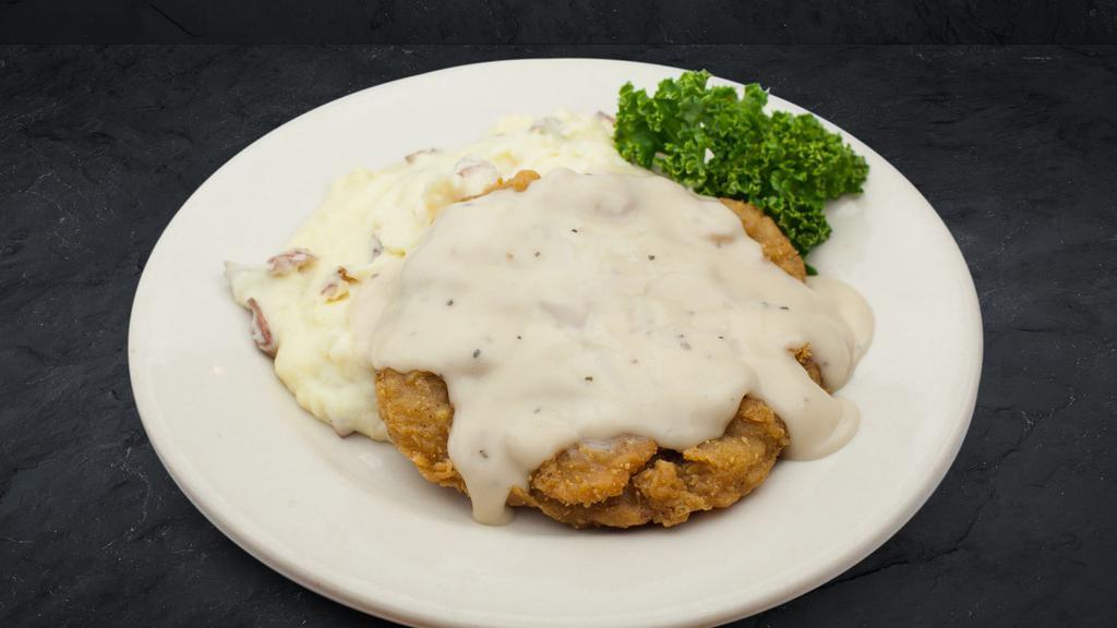 Tony'S Country Fried Steak · Featured on Kix Brooks Great American Steakout, Hand breaded steak, deep fried and smothered with Cattleman’s white skillet gravy.