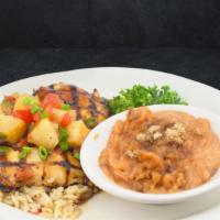 Pineapple Chicken · A sweet and savory delight! Juicy grilled boneless breast of all-natural chicken with a savo...