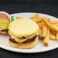 Cowboy Double Cheeseburger · This belly buster boasts two, half pound Cattleman’s Gold Certified burgers, topped with you...