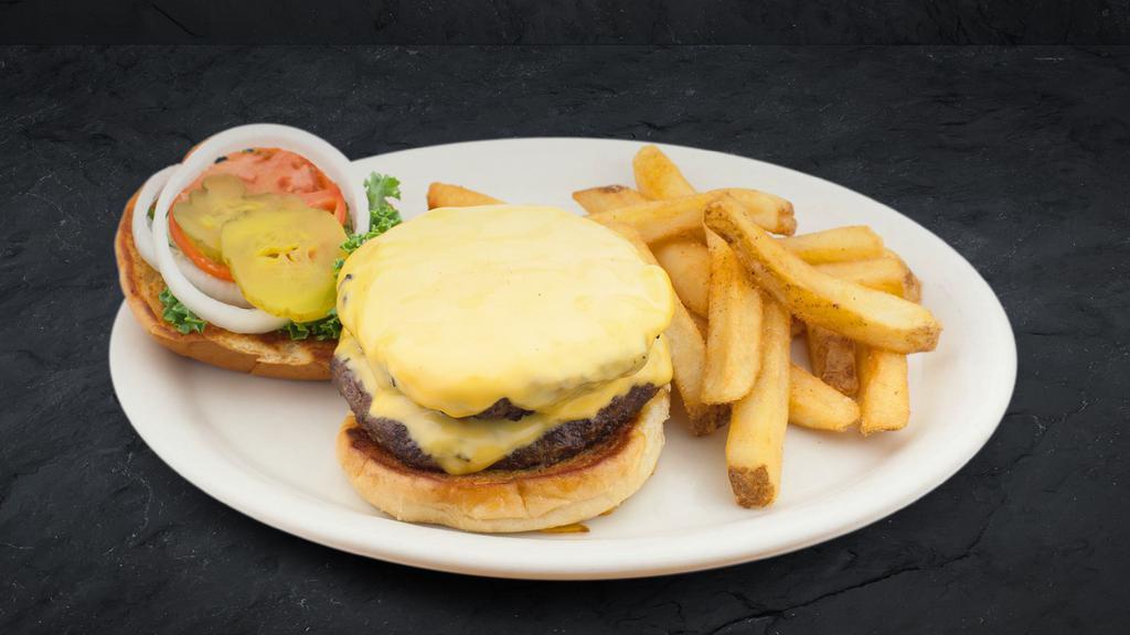 Cowboy Double Cheeseburger · This belly buster boasts two, half pound Cattleman’s Gold Certified burgers, topped with your choice of: American, Swiss, Cheddar or Pepper Jack cheese.