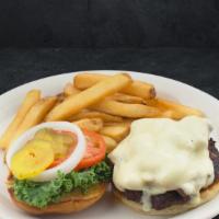 Mushroom + Swiss Burger · Half pound Cattleman’s Gold Certified burger, smothered with sautéed mushrooms and topped wi...