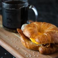 Classic Breakfast Sandwich · Bacon, egg and cheese on toasted croissant