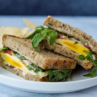 Healthgrain Breakfast Sandwich · Healthgrain bread, aioli, fried egg, tomato, spinach, smoked provolone