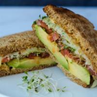 Avocado Melt · Sliced avocado, tomato, spinach, mozzarella cheese, dijonnaise served on toasted Healthgrain...
