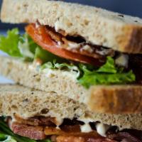 Bacon, Lettuce & Tomato · Bacon, lettuce, tomato, mayo served on toasted Healthgrain bread.  Comes with chips or baby ...