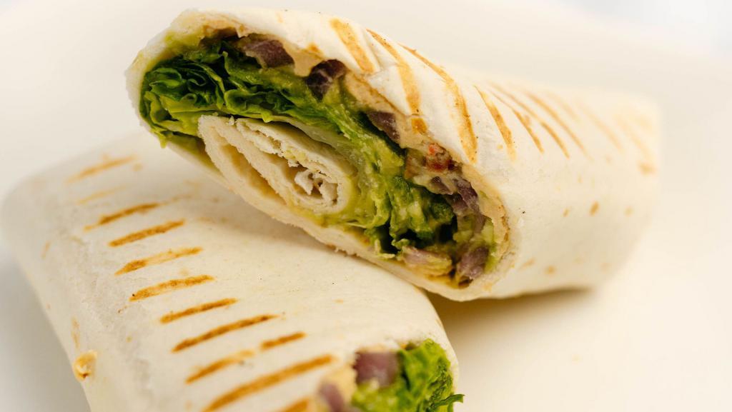 Hummus Wrap · Hummus, tomato, avocado, spinach, pickled onion and mozzarella cheese in a grilled wrap