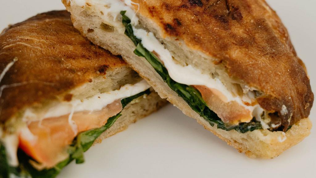 Caprese Sandwich · Mozzarella, Tomato, Basil on a Ciabatta Bun.
