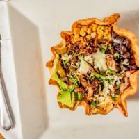 Crispy Carnitas Bowl · Pork carnitas, lettuce bed, cilantro-lime rice, black beans, com jalapenos, pico de gallo an...