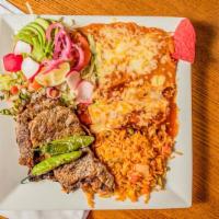 Carne Azada · Mexico city style. A choice steak in a strip. Served with guacamole, rice, beans and a chees...