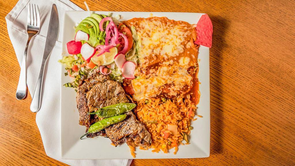 Carne Azada · Mexico city style. A choice steak in a strip. Served with guacamole, rice, beans and a cheese enchilada with red sauce.
