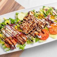 Marinated Chicken · Spring lettuce, tomatoes, cucumbers, red onion, Greek olives, banana peppers,feta cheese, an...