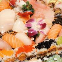 Sushi & Sashimi For 2 · 10 pcs sushi, 18 pcs sashimi, rainbow roll and fried work roll.