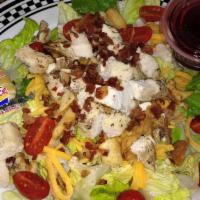 Grilled Chicken Salad · Lettuce, tomatoes, chicken breast, cheddar, bacon & walnuts.